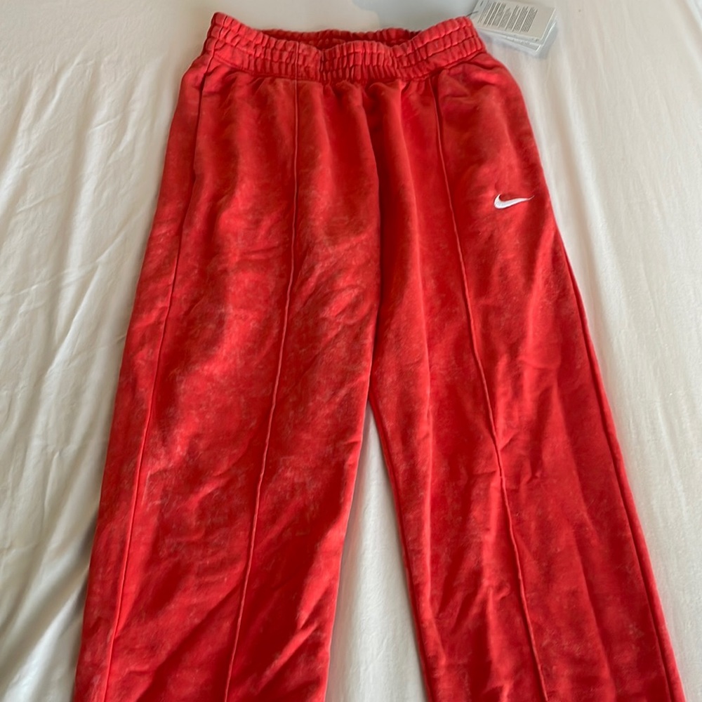 Red Nike sweats
